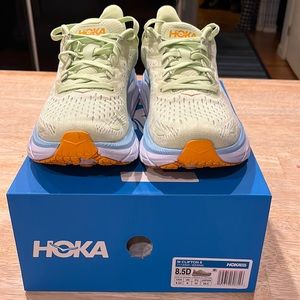HOKA Clifton 8 Men’s 8.5 light green, blue and orange. Lightly worn…Women’s 9.5